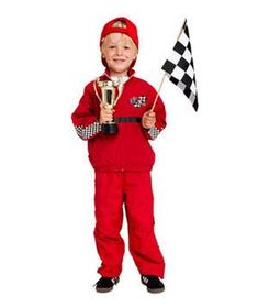 a little boy in a red racing suit holding a trophy and a checkered flag