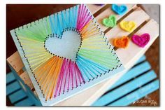 the book is filled with colorful crochet hearts