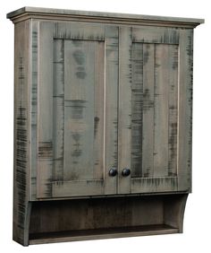 an old wooden cabinet with two doors