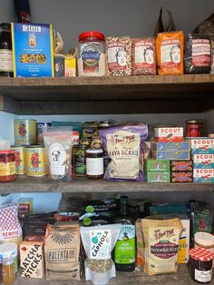 shelves filled with different types of food and condiments on top of each other