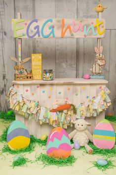 an egg hunt stand with stuffed animals and decorations