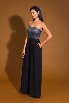 A woven jumpsuit featuring contrasting tube top, solid woven pant with front pleats, side pocket, wide leg and back zipper closure Details: Self : 97% Polyester 3% SpandexContrast : 100% PolyesterLining : 100% Polyester Size & Fit - Model is 5`8" And Wearing Size Small- Measurements Taken From Size Small- Approx. Length: 53" Inseam- 29" High Waist Pantsuit With Pockets For Party, Party Overall Jumpsuits And Rompers With Pockets, Party Overalls With Pockets, Party Wide-leg Pantsuit With Pockets, Party Pantsuit With Pockets And Wide Leg, Party Wide Leg Pantsuit With Pockets, Strapless Jumpsuit, Woven Design, Black Jumpsuit