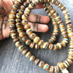 Unique and powerful Nepali Yak Bone Mala. Each bead has bras and small stone details. A unique unisex piece that will be perfect for your day by day outfits. The Mala is 40.6cm- 16 inch long A most have addition to your jewelry collection. Enjoy Con salud Spiritual Wooden Beads Jewelry For Meditation, Traditional 8mm Bead Jewelry For Festivals, Traditional 8mm Beaded Jewelry For Festivals, Wooden Beads Amulet Jewelry For Meditation, Meditation Amulet With Wooden Beads, Spiritual Wooden Beads Jewelry For Healing, Wooden Beads Amulet Necklace For Meditation, Meditation Amulet Necklace With Wooden Beads, Wooden Beads Amulet Necklace As A Gift