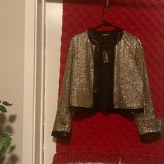 Nwt Black & Gold Sequin Trim Jacket Purchased From Express, The Pictures Really Don’t Do This Jacket Justice - Incredibly Shiny!! In New Condition, Never Worn. Glamorous Holiday Workwear Outerwear, Chic Holiday Outerwear For Night Out, Gold Outerwear For Winter Night Out, Gold Outerwear For Night Out In Winter, Elegant Cropped Jacket For Night Out In Fall, Gold Long Sleeve Outerwear For Night Out, Gold Outerwear For Night Out, Chic Holiday Outerwear, Elegant Cropped Jacket For Fall Party