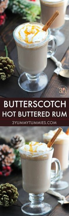 two cups filled with hot buttered rum and topped with whipped cream, cinnamon sticks