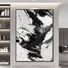 black and white painting on the wall in a modern living room