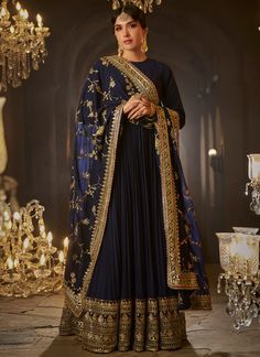 Our Navy Blue Embroidered Anarkali includes a georgette top with santoon inner, santoon bottom, and a georgette dupatta. Embroidery is present on this style using zari, sequins, and thread work. Like all of our pieces, this piece is made in India and checked by hand to ensure high quality. Navy Blue Pakistani Dress, Blue Pakistani Dress, Navy Blue Anarkali, Eid Outfit Ideas, Indian Suits For Women, Floor Length Anarkali, Embroidered Anarkali, Women Kurta, Dress Indian Style