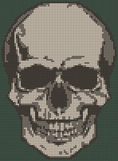 a cross stitch skull is shown in black and white