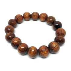 Koa Wood Bead Bracelet 12mm - Makana Hut Casual Wooden Beaded Jewelry, Brown Beaded Bracelets With Wooden Beads, Brown Wooden Beaded Round Bracelets, Brown Wooden Beads Bracelet, Brown Stretch Bracelet For Meditation, Brown Stretch Bracelet With 8mm Round Beads, Casual Brown Stretch Bracelet For Healing, Wood Bead Bracelet, Koa Wood