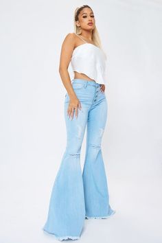 A pair of high rise flare jeans featuring short fringed leg openings, subtle distressed front, faux front pockets, two back pockets, and a 5 button up closure. Rise: 10.25" Inseam: 34" Model is 5'4" and wearing a size 3 Ture to size Trendy Fitted Distressed Flares, Summer Flares With Frayed Hem, Summer Distressed Flare Jeans, Distressed Flare Jeans For Summer, Distressed High-rise Fitted Flares, Distressed High Rise Fitted Flares, Fitted High Rise Distressed Flares, Distressed Fitted Flares For Spring, Fitted Distressed Flares For Spring