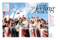 a group of people standing next to each other on top of metal buckets in front of a blue sky