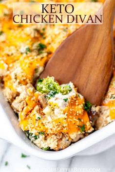 a casserole dish with chicken and broccoli in it, topped with a wooden spoon