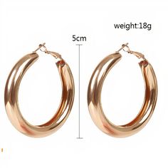 Stay on trend with these gold and silver plated thick hoops. - Care Instructions: Avoid contact with water, lotion, and perfume. Clean gently with a polishing cloth. Product Specifications: - Elegant and versatile design - Hypoallergenic for sensitive ears - Adds a touch of glamour to any outfit Trendy Rose Gold Tarnish-resistant Hoop Earrings, Classic Metal Hoop Earrings For Party, Trendy Rose Gold Metal Hoop Earrings, Trendy Rose Gold Hoop Earrings, Chic Rose Gold Metal Hoop Earrings, Trendy Metal Jewelry With Shiny Finish, Perfume Clean, Lotion And Perfume, 14k Rose Gold Wedding Ring