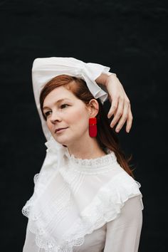 This is a pair of eye-catching statement earrings in a simple, geometric design- the top square is a bright cherry red color and the bottom rounded shape is a faded, dusty red color. These earrings have a minimalist design that is timeless, while the bright duo-tone colors add a modern vibe. These earrings are crafted using polymer clay, a surprisingly lightweight material that won't weigh you down. Each earring is carefully sanded and smoothed to ensure a well-made piece of jewelry that is comf White Minimalist Linear Earrings For Party, Minimalist White Linear Earrings For Party, Modern Adjustable Wedding Earrings, Adjustable Minimalist Earrings For Party, Red Minimalist Dangle Earrings, Cherry Red Color, Duo Tone, Earrings Clay, Long Drop Earrings