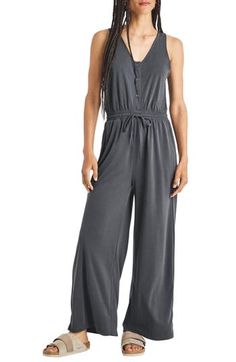 Amp up your causal-cool vibe in this sandwashed jumpsuit that moves stylishly from errands to an afternoon date. 26 1/2" inseam Front button closure V-neck Sleeveless Front slant pockets Attached waist tie 72% modal, 28% polyester Machine wash, tumble dry Imported Casual Sleeveless Washed Jumpsuits And Rompers, Coverall Jumpsuit, Nordstrom Store, Fabric Gifts, Anniversary Sale, Free Fabric, Tumble Dryer, Waist Tie, Jumpsuits For Women