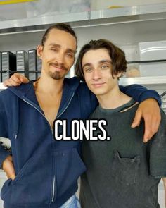 two men standing next to each other with the words cloness on their faces