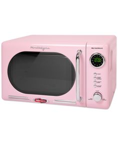 a pink microwave oven with the door open