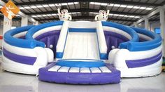 an inflatable slide with two dogs on it