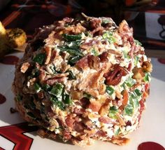 a ball of food sitting on top of a white plate