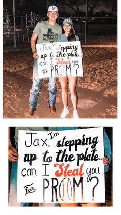 two people holding up signs in front of a baseball field at night and the same person standing next to them