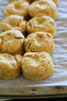 cookies are lined up on a baking sheet