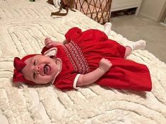 This beautiful red baby girl dress hand smocked in white and hand embroidered with white flowers . The dress completes it's look with white Peter Pan collar and beautiful smocked puffed sleeves. Dress is fully lined with a soft cotton material. The back closes with a zip and tie sashes. 3-6 months & 6-12 months sizes come with a bow attached headband. Size 1 onwards come with a bow clip. Material Outside- 100% Cotton Lined with soft cotton fabric Recommend Dry clean only Available sizes: Size 3- Cute Red Smock Dress, White Smocked Dress, Dress With A Bow, Girls Smocked Dresses, Dress Baby Girl, Headband Size, Baby Blue Dresses, Hand Smock, Red Baby