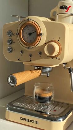 an espresso machine sitting on top of a counter