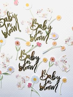 baby shower stickers with flowers and the words baby born on them in gold foil