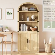 a wooden bookcase sitting next to a window