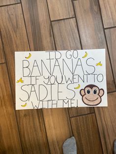 someone is holding up a sign that says, go bananas if you went to sadles when