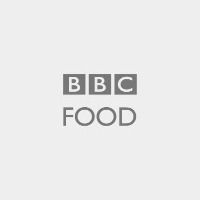 the bbc food logo is shown on a white background with grey letters and an image of a