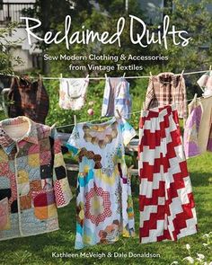 the cover of quilted quilts, featuring clothes hanging on a line with flowers in the background