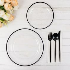 black and white place setting with roses