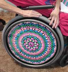 This is a PDF Pattern NOT a crocheted wheel cover. Thank you!  This Snap in & out pattern PDF wheelchair wheel cover of 31 pages with text, photos, and links to videos showing the stitches process used including instructions on how to create the flexible hoop you will need to create a great and cool idea as shown in the original image.  * This listing is for the PDF crochet pattern only. Wheelchair, rings, frame, and finished Wheelchair Wheel Cover are not included. If you are looking for a whee Wheelchair Wheel Covers, Wheelchair Accessible Home, Adaptive Tools, Wheel Decor, Mobility Aids, Cover Style, Text On Photo, Wheel Cover, Chronic Illness