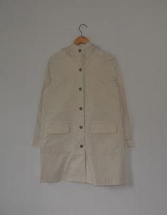 Cool Junko Shimada Light jacket for ladies Used jacket, Show sign of normal wear, Minor soft stains on jacket, Overall in good vintage condition (Please refer picture) Size on tag 9 (Japan sizing) with actual measurement taken when lying flat armpit 20 inches and 33 inches in total lenght. (Approx) Lenght from neck stitching to cuff: 27 Inches Two front pocket. Please note that vintage sizing is not the same as modern sizing. Always go by the measurements we provide and compare them to an item t Beige Cotton Long Sleeve Windbreaker, Beige Cotton Windbreaker, Beige Cotton Windbreaker For Streetwear, Vintage Long-sleeved Cotton Hooded Jacket, Vintage Cotton Hooded Jacket With Long Sleeves, Junko Shimada, Neck Stitching, Navy Blue Crewneck, Outerwear Sweater