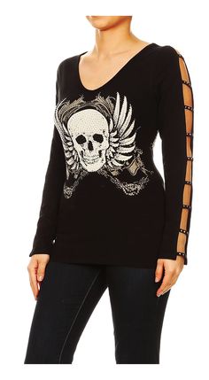 Length of blouse: Size XL = 27 inches; 1x = 27 inches; 2x = 27.5 inches; 3x = 28 inches laid flat Top features stunning graphic of biker motorcycle gothic skull with wings on front and back You will stand out in this unique, ladder cut out peek-a-boo long sleeves shirt Eye catching shimmering rhinestones sprinkled on the artwork; Quality cotton soft fabric Casual all occasions streetwear with leggings or jeans; perfect for packing on cruise or vacation Wash instruction: We recommend hand wash or Gothic Skull Tattoo, Skull With Wings, Skull Motorcycle, Affliction Clothing, Plus Size Gothic, Biker Outfit, Gothic Skull, Tan Top, Clothing Brands