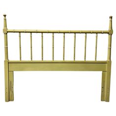 the headboard is made of bamboo and has two posts on each side, with one end