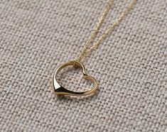 This Open Heart Necklace and chain are 14k Solid GOLD ( not filled or plated). Solid Gold Open Heart Necklace in 14k Gold, Rose Gold, White Gold. #openheartnecklace #HeartNecklace #HeartPendant #HeartCharm #zirconnecklace #heartzircon #womannecklace #goldjewelry #solidgoldnecklace #necklaceforwomen #goldpendant #romanticgifts #giftforher #goldjewelrygift #christmasgift #valentinesdaygift #romanticgifts #giftsforbestfriend #etsyjewelry #mothergift #birthdaygift Gold Heart Necklace Perfect For Gifts, Gold Heart Detail Necklace For Gift, 14k Gold Open Heart Necklace For Her, Yellow Gold Open Heart Necklace, Gold Heart Necklace For Anniversary, Yellow Gold Open Heart Necklace Gift, Gold Heart Cut Jewelry With Heart Detail, Gold Plated Open Heart Necklace For Mother's Day, Gold Heart Cut Necklace As Gift For Her