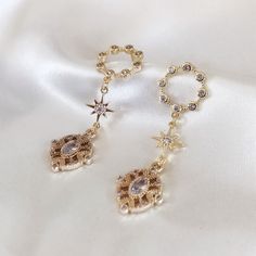 "24k Gold Plated Earrings, Gold Dangle Earrings, Vintage Inspired Gold Earrings, Gold Dainty Earrings, Dainty Dangle Earrings, Gold Earrings FREE U.S. SHIPPING ON ORDERS OVER $35 Measurements: 1.75\" drop length Weight (pair of earrings): 3.6 grams Material: 24k gold plated + cubic zirconia ★ Please keep in mind that all items are being shipped from Japan. ★ All pieces are insured. If you receive an item that has been damaged during transit, please let me know. ★ I represent each piece in a very Dainty Dangle Earrings, Dangle Earrings Gold, Gold Dangle Earrings, Earrings Dainty, Earrings 3, Shell Jewelry, Gold Earrings Dangle, Dainty Earrings, Stunning Jewellery