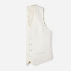 This ivory satin vest has you covered. From layered under a jacket, to boogie-ing without one on the dance floor, it's designed to make a statement. 100% super-fine Italian merino wool Five-button closure Full Backing Ivory satin accents Ivory Tuxedo, Bridal Logo, Suit Prom, Twitter Logo, Tuxedo Vest, Black Tux, On The Dance Floor, Tuxedo Shirts, A Jacket