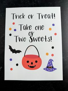 a trick or treat sign on a table