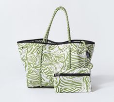 Embrace versatility and style with the Pop Ups Brand Everyday Neoprene Tote, your go-to bag for work, gym, beach, and travel. This oversized yet lightweight tote is crafted from luxe perforated neoprene, featuring soft sailing rope handles for comfortable carry. It's water-resistant, breathable, and comes with a detachable essentials pouch, making it the perfect blend of functionality and effortless style. From Pop Ups Brand. Casual Green Travel Bag With Removable Pouch, Casual Double Handle Weekender Bag For Daily Use, Functional Reversible Tote Bag, Summer Reversible Double Handle Bags, Everyday Tote Beach Bag With Top Carry Handle, Casual Weekender Tote Bag With Top Handle, Casual White Travel Bag For Daily Use, Casual Green Shoulder Weekender Bag, Green Beach Bag With Removable Pouch For Vacation