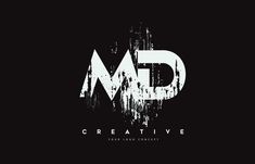 the letters m and d are made up of white paint on black paper, which reads creative