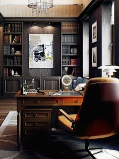 a home office with lots of bookshelves and leather chairs in front of the desk