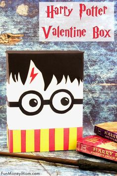 a harry potter valentine box next to some books