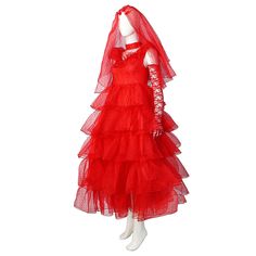 a mannequin wearing a red dress and veil