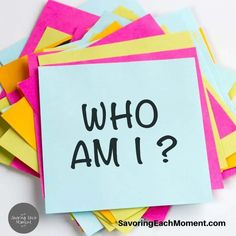 a pile of post it notes with the words who am i?