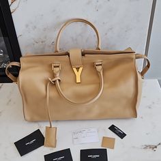 Barely Worn In Excellent Condition! Still Have The Original Tags. I Will Have To Look For A Dust Bag So Pls Message Me If You Need One. Ysl Cabas Bag, Bags Ysl, Ysl Saint Laurent, Saint Laurent Bags, Yves Saint Laurent Bags, Beige Color, Womens Tote Bags, Yves Saint Laurent, Calf Skin