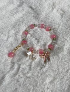 Cute pink valley lillies charm bracelet with accents of white and gold! Feel free to ask any questions :) *All shipping is non-tracked Please check out my other listings in my store for similar products :D P.S. every order comes with small freebies as a thank you Cute Pink Crystal Bracelet With Round Beads, Pink Flower Charm Bracelet For Jewelry Making, Pink Beaded Flower Charm Bracelet, Pink Flower-shaped Beaded Charm Bracelet, Beaded Charm Bracelet, Pink Coquette, D P, British Columbia Canada, Bead Charm Bracelet