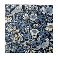 a blue and white floral wallpaper with birds on it